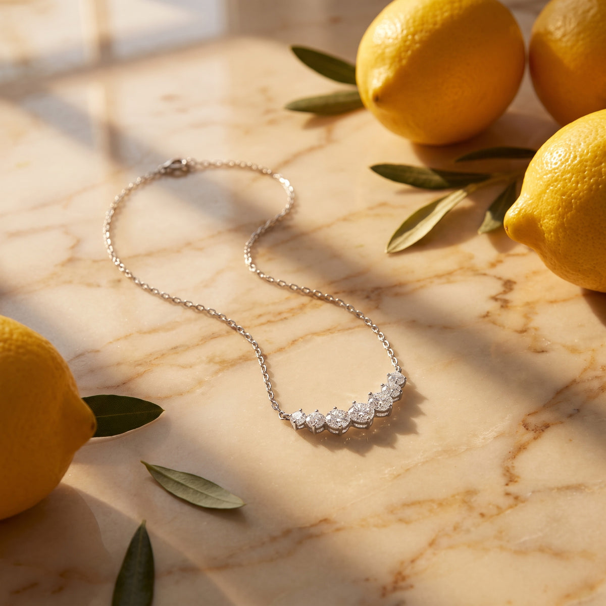 On warm honey-veined marble with the shadow of a window and leaves falling across it, golden morning sun.